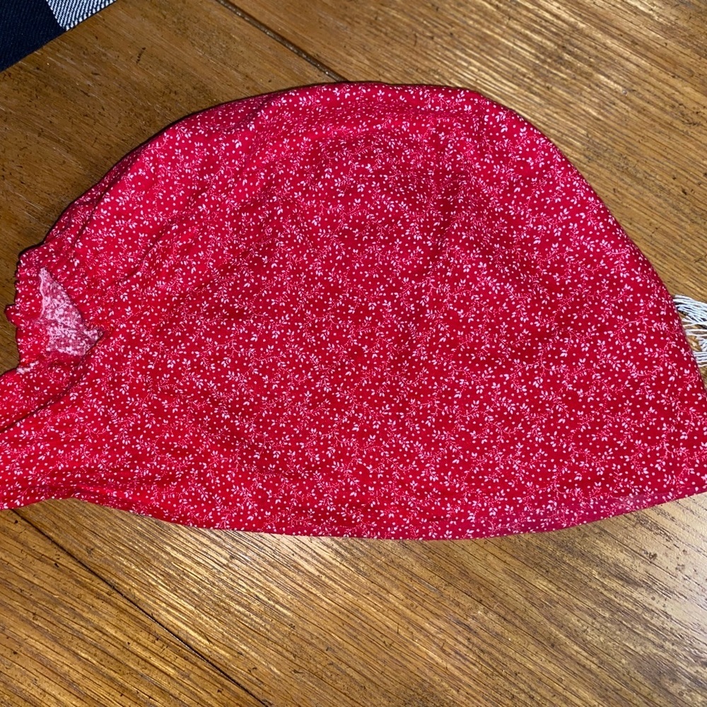Red & white USED scrub cap.